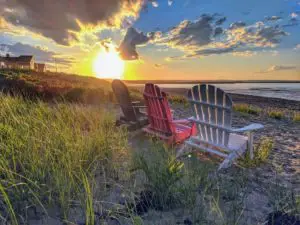 105476288 - red white and blue chairs at sunset